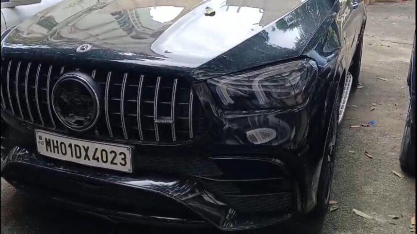"Navi Mumbai Kharghar Road Accident involving Mercedes and scooter; woman killed, husband injured, student driver held"
